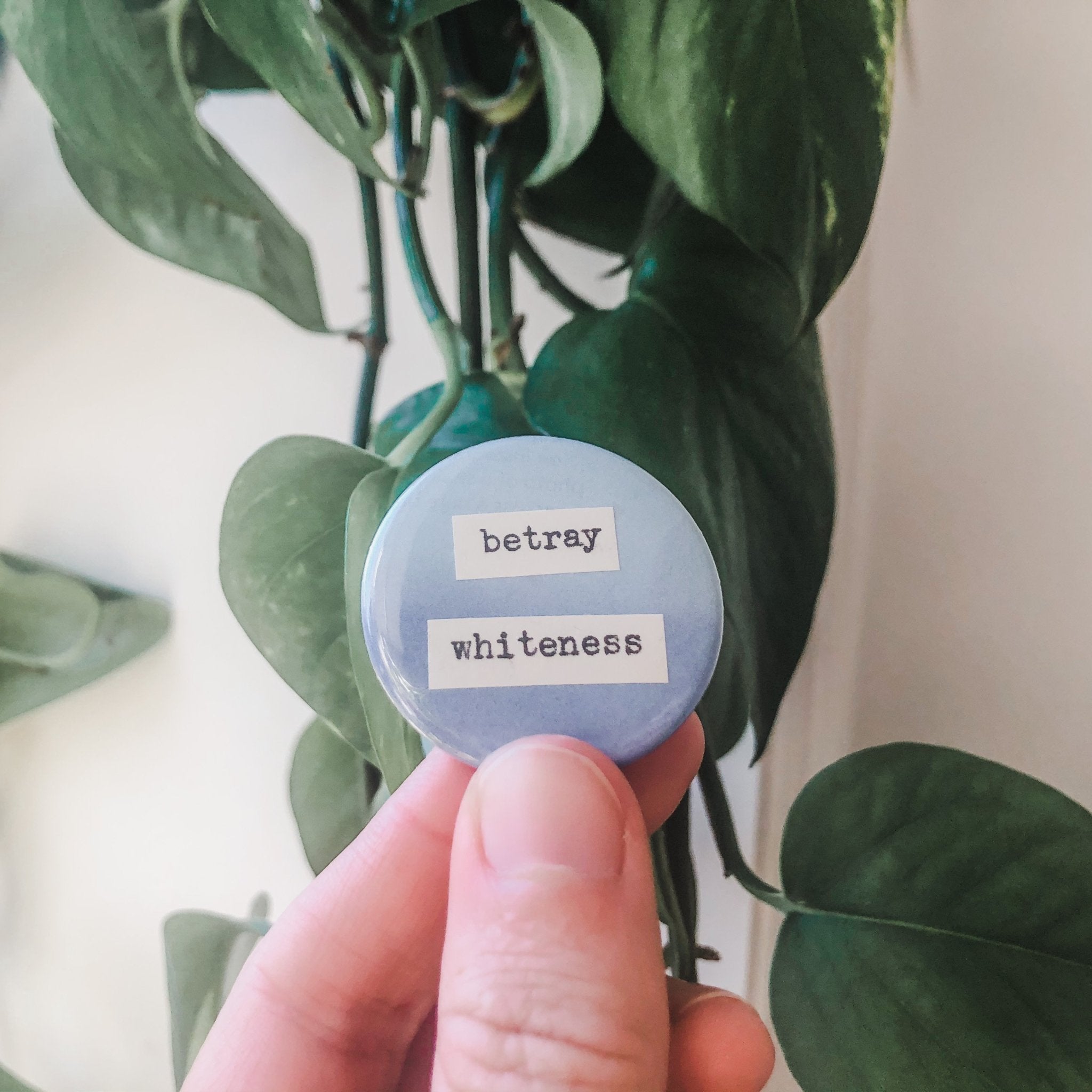 betray whiteness button