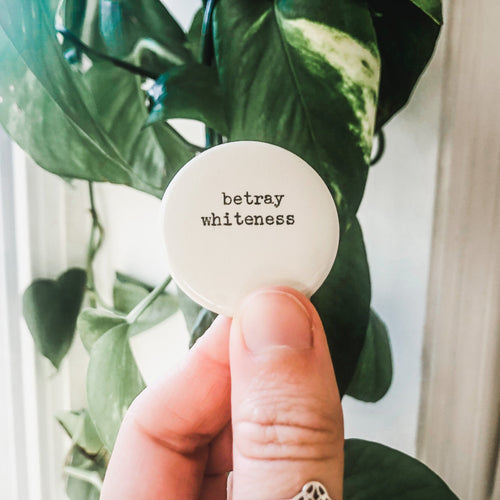 betray whiteness button