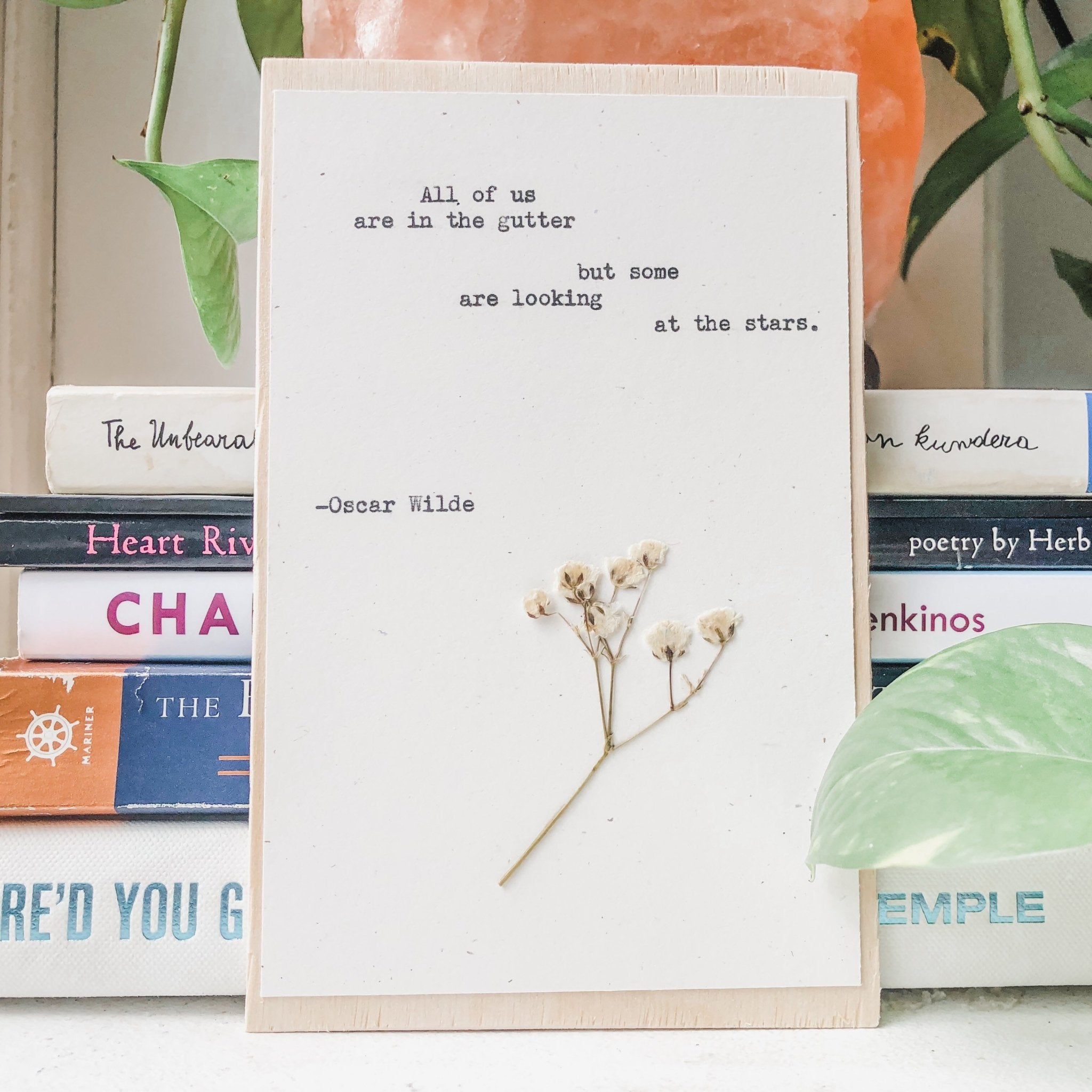 oscar wilde, all of us are in the gutter but some are looking at the stars